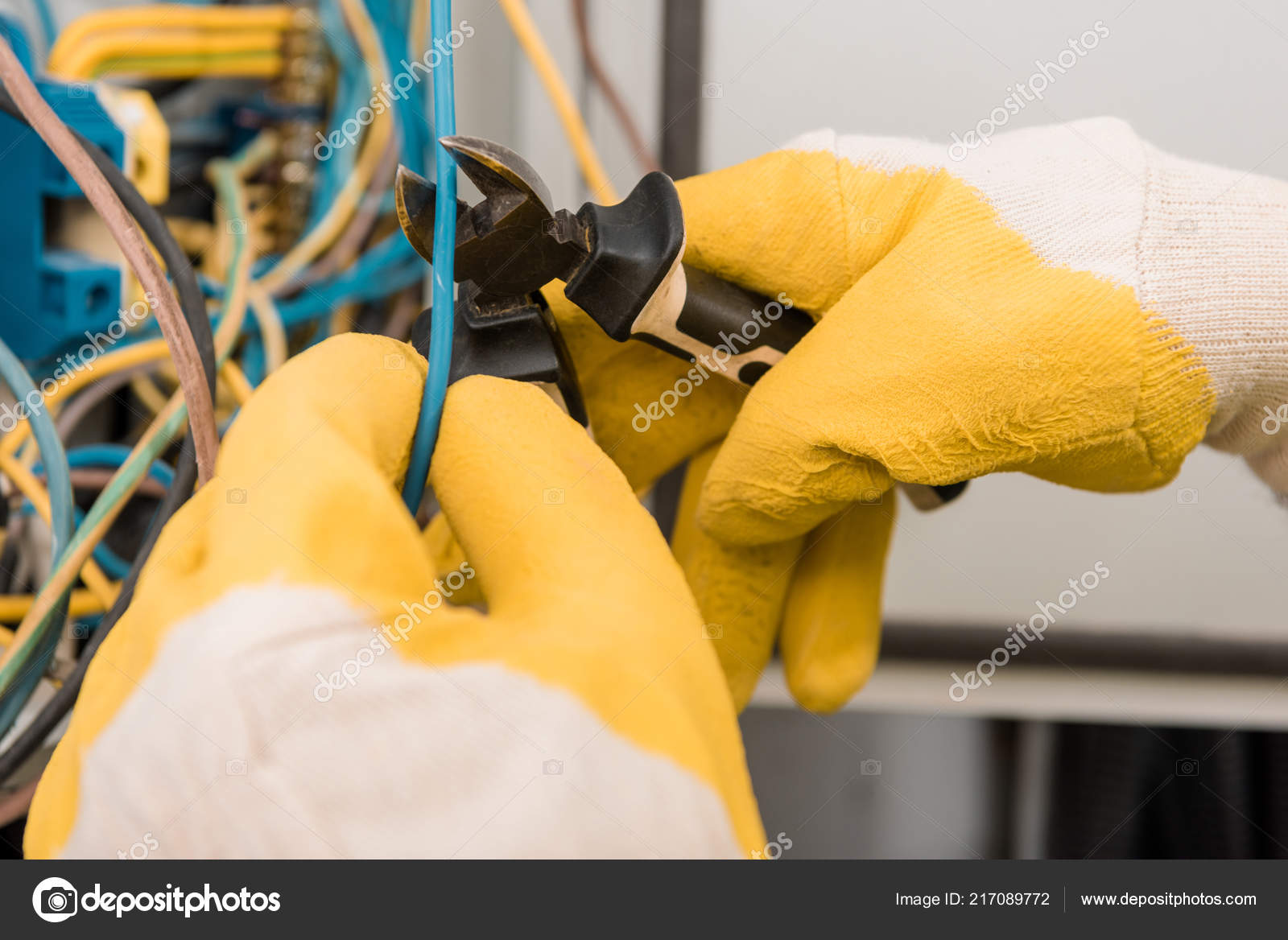 Cropped Image Electrician Cutting Wires Electrical Panel Pliers