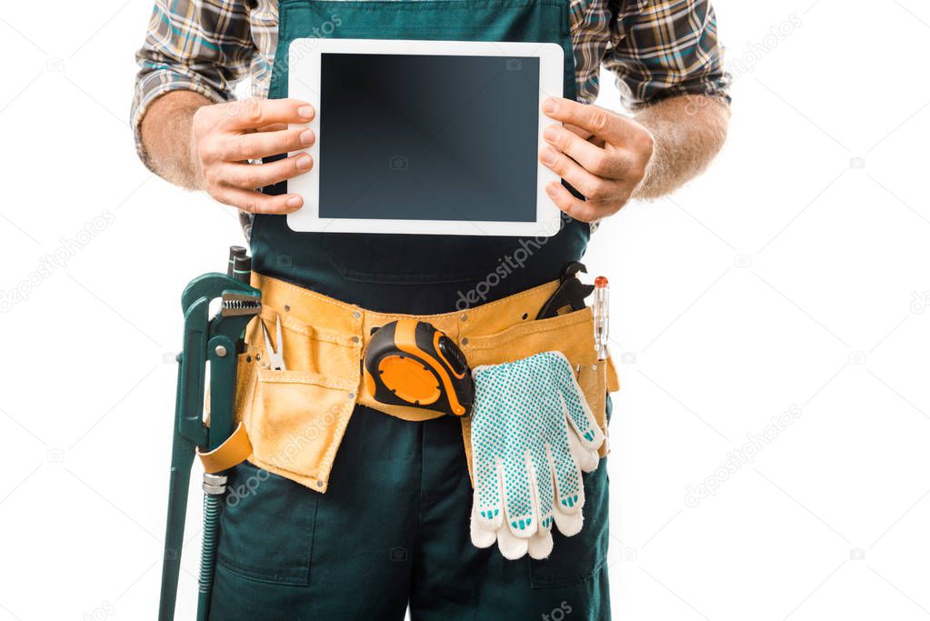 cropped image of plumber showing tablet with blank screen isolated on white