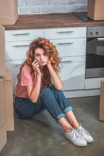 Upset Attractive Woman Curly Hair Sitting Floor Cardboard Boxes Talking — Stock Photo, Image