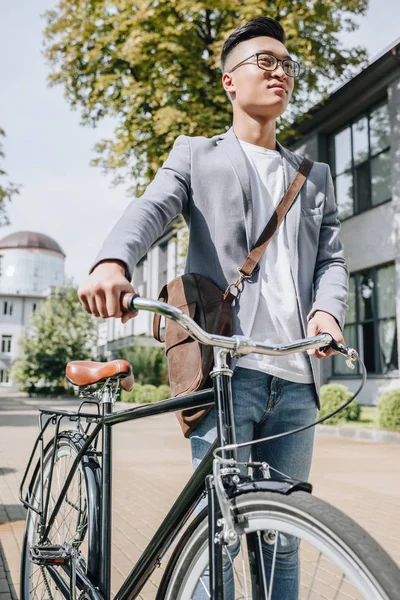 Handsome Asian Man Walking Bike City — Free Stock Photo