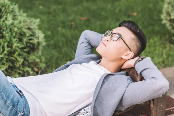 Handsome Stylish Asian Man Dreaming Lying Bench — Stock Photo, Image