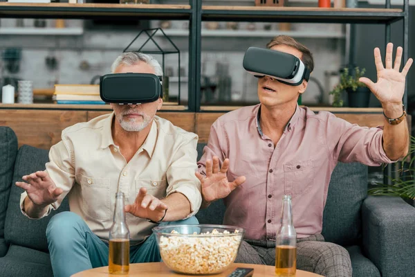 Handsome Mature Male Friends Sitting Couch Using Virtual Reality Headsets — Stock Photo, Image