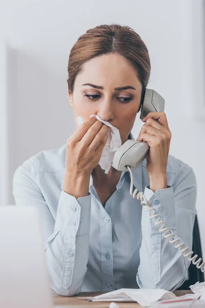 Close Portrait Businesswoman Runny Nose Talking Wired Phone Office — Stock Photo, Image