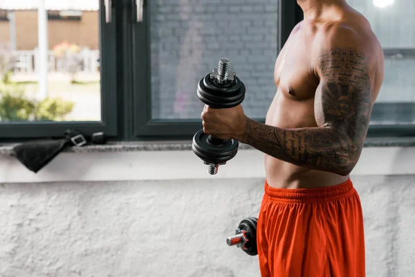 Cropped Image Muscular Shirtless African American Sportsman Exercising Dumbbells Gym — Free Stock Photo