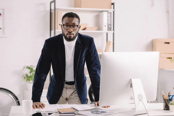 Handsome African American Architect Working Blueprint Workspace Computer — Free Stock Photo