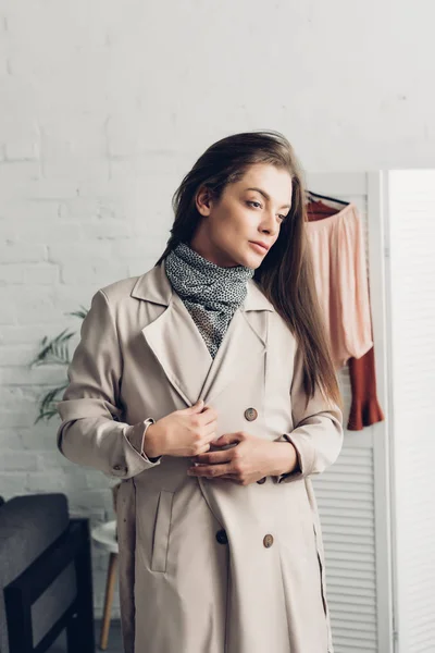 Stylish Young Transgender Woman Trench Coat Home — Free Stock Photo