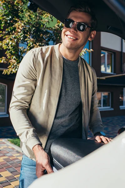 Smiling Man Putting Baggage Car Travel Concept — Stock Photo, Image