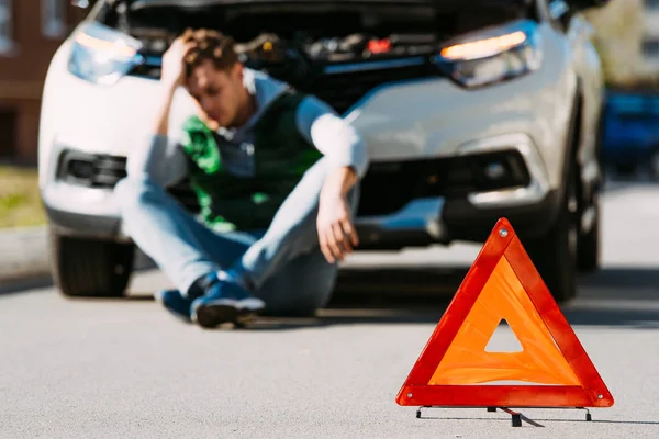 Close View Road Sign Upset Man Sitting Broken Car Road — Stock Photo, Image