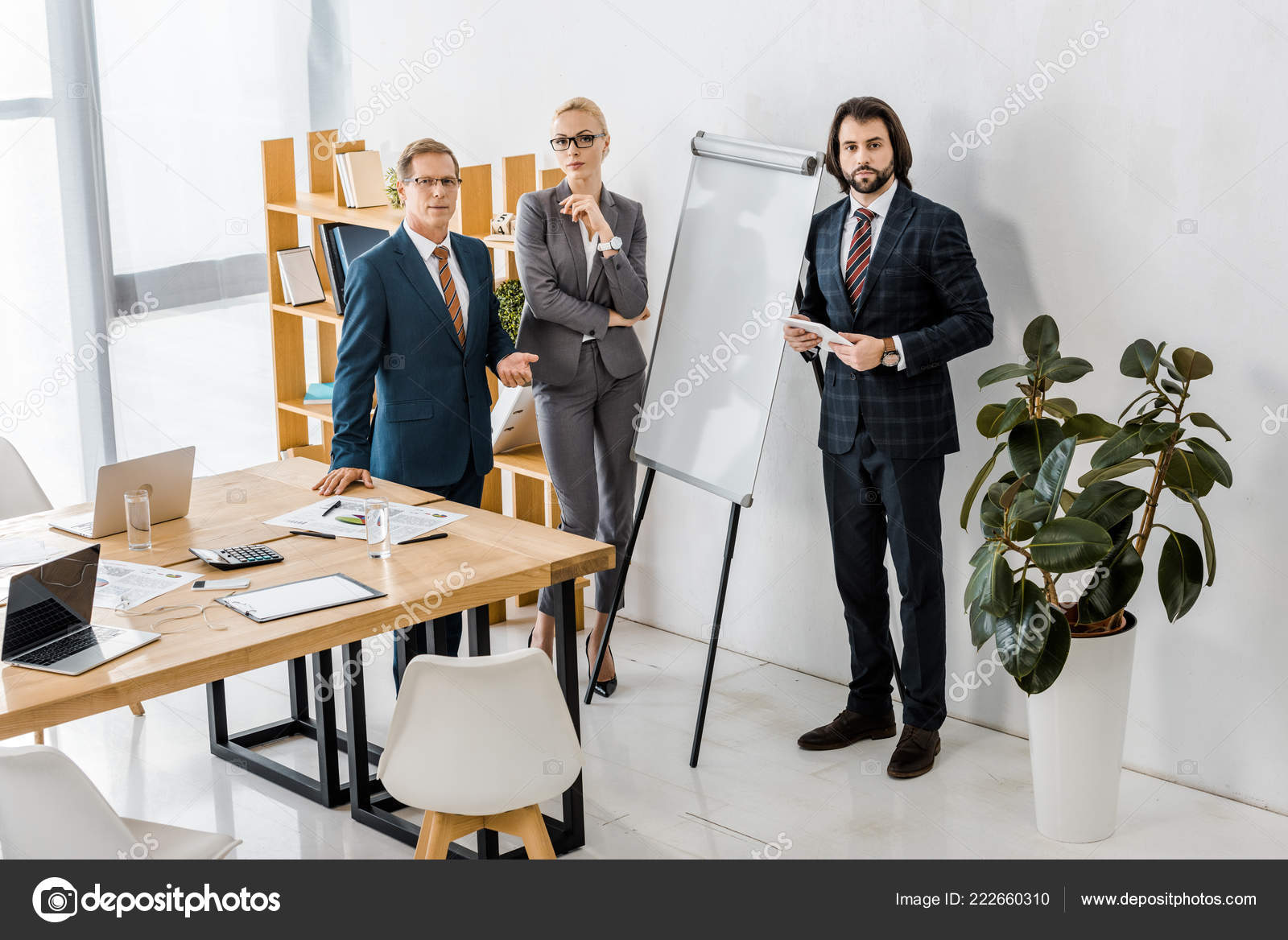 Office Workers Standing White Board Having Discussion — Free Stock Photo ©  AndrewLozovyi #222660310