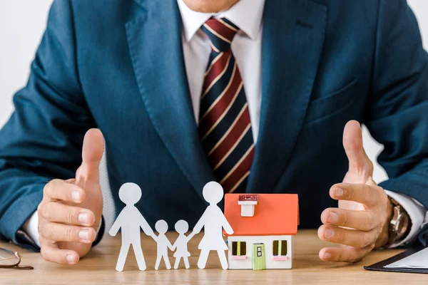 Male Hands Wooden Table Paper Cut Family House Model — Stock Photo, Image