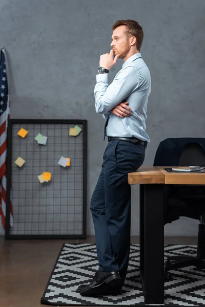 Side View Pensive Young Businessman Standing Modern Office — Free Stock Photo