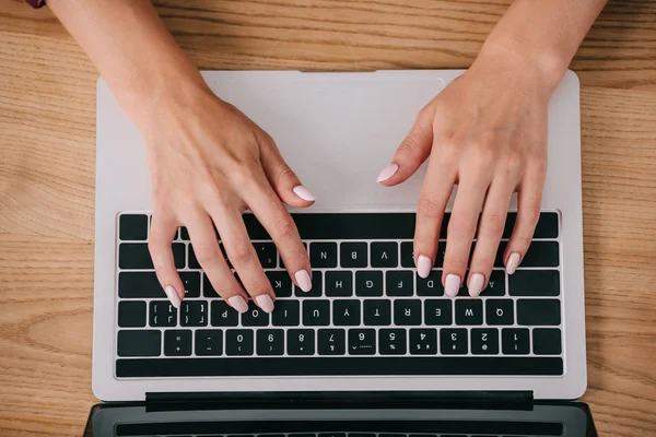 Partial View Woman Typing Laptop Wooden Tabletop — Stock Photo, Image