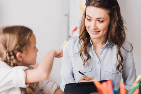Happy Psychologist Clipboard Sitting Little Child Chatting While She Drawing — Stock Photo, Image