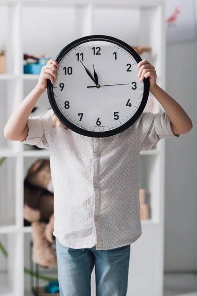 Little Child Covering Face Big Clock — Stock Photo, Image