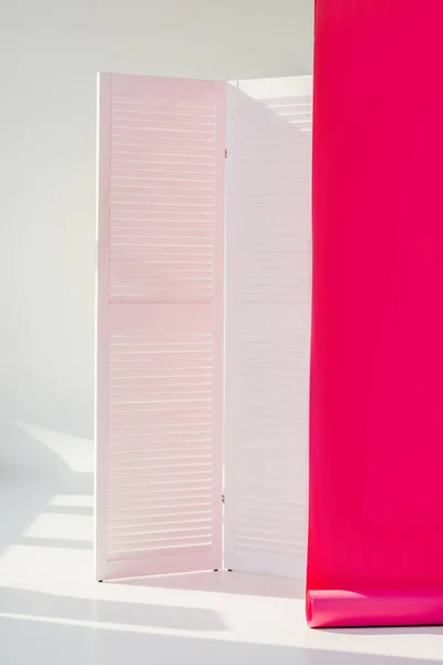 White Room Divider Bright Pink Rolled Out Wallpaper — Free Stock Photo