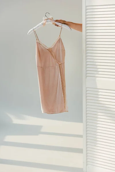 Female Hand Holding Hanger Silk Nightie — Stock Photo, Image