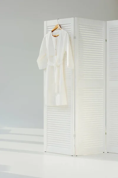 Elegant White Dress Hanging Wooden Room Divider — Stock Photo, Image