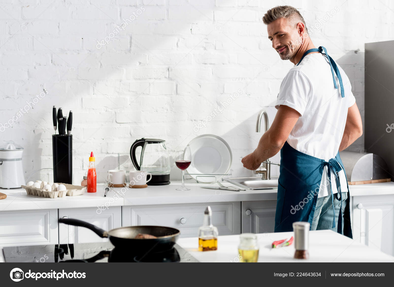 Adult Man Washing Dishes Kitchen Stock Photo Image By Andrewlozovyi 224643634