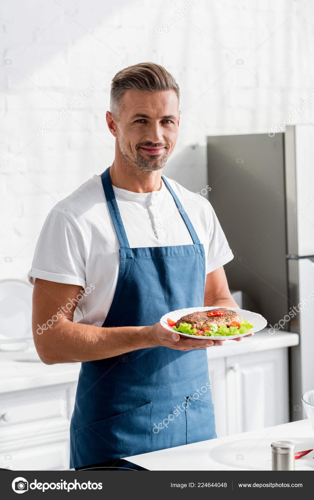 Man Wearing Apron and Cooking Stock Photo - Image of preparing, healthy:  31670526