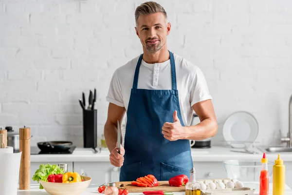Man Showing Thumbs Knife Hand Standing Kitchen — Stock Photo, Image