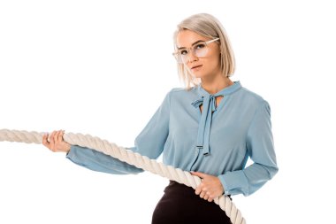Beautiful blonde businesswoman in glasses pulling rope isolated on white clipart