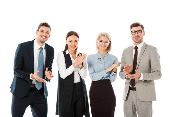 successful smiling business team celebrating and applauding isolated on white