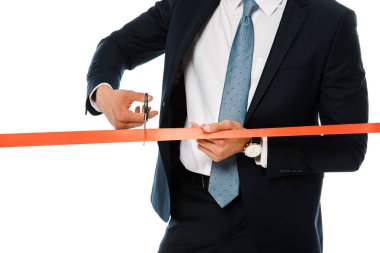 cropped view of businesswoman cutting red ribbon with scissors for grand opening, isolated on white clipart