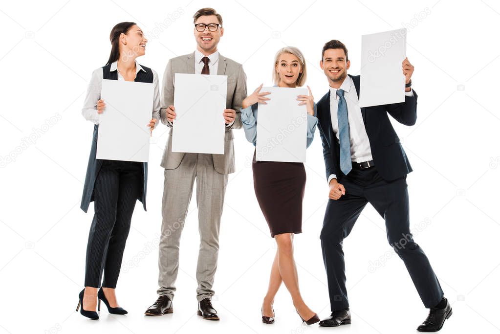 cheerful businesspeople holding empty boards isolated on white