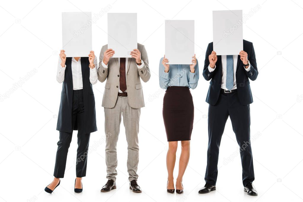 business team hiding behind empty boards isolated on white