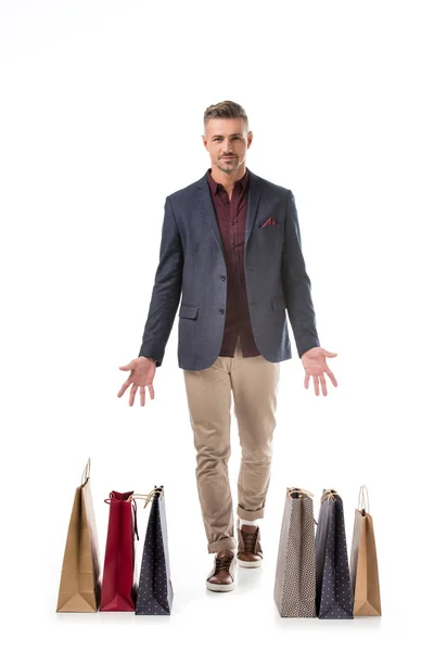 Alegre Hombre Con Estilo Chaqueta Que Apunta Las Bolsas Compras — Foto de Stock