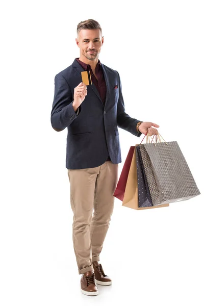 Homem Elegante Alegre Com Sacos Compras Mostrando Cartão Crédito Isolado — Fotografia de Stock