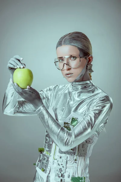 Robot Futuristic Eyeglasses Holding Apple Looking Camera Isolated Grey Future — Free Stock Photo