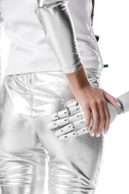 cropped image of woman stopping robot touching her buttocks isolated on white, future technology concept clipart
