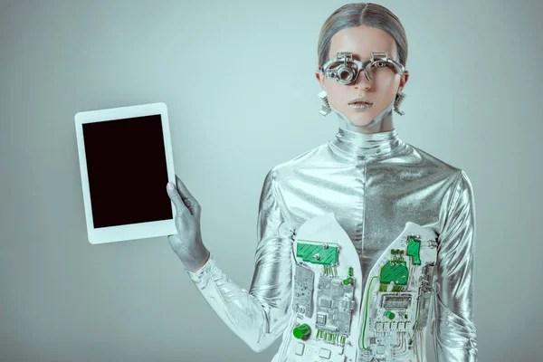 Silver Robot Holding Tablet Blank Screen Looking Camera Isolated Grey — Stock Photo, Image