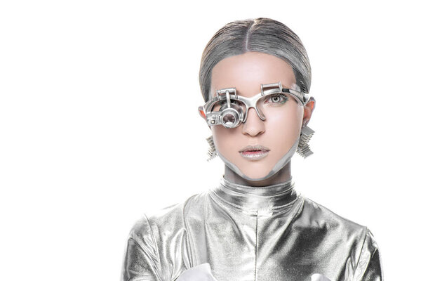 portrait of silver robot with eye prosthesis looking at camera isolated on white, future technology concept