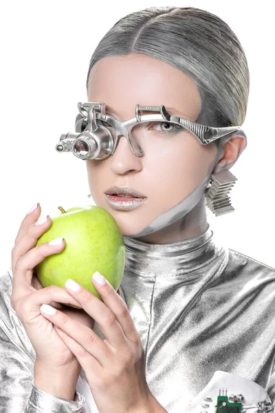 Portrait Silver Cyborg Holding Apple Looking Camera Isolated White Future — Free Stock Photo