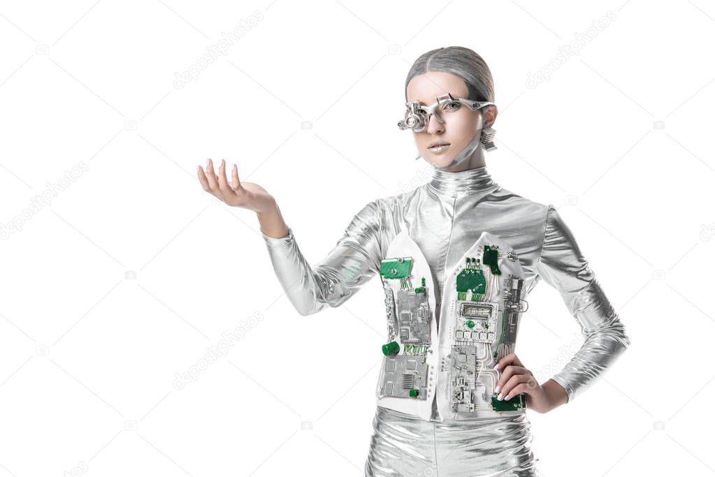 silver robot holding something and looking at camera isolated on white, future technology concept