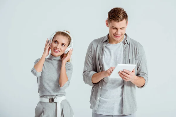 Cheerful Woman Headphones Listening Music While Man Using Digital Tablet — Stock Photo, Image