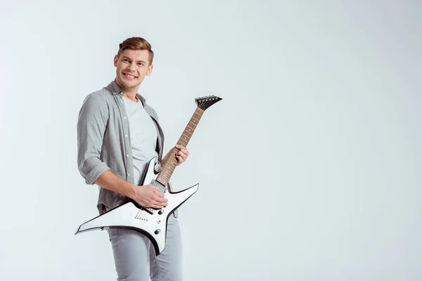 Animado Bonito Homem Roupas Cinza Tocando Guitarra Elétrica Isolada Cinza — Fotografia de Stock