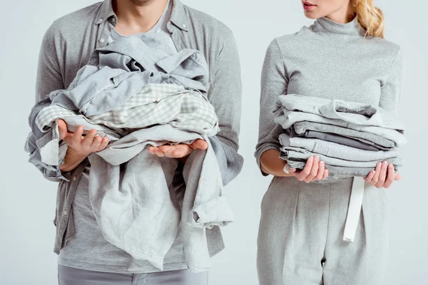 Partial View Couple Holding Grey Clothes Isolated Grey — Stock Photo, Image