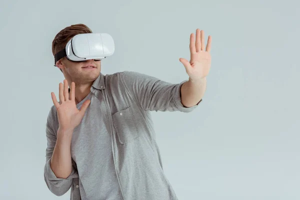 Surprised Man Gesturing While Wearing Virtual Reality Headset Isolated Grey — Stock Photo, Image