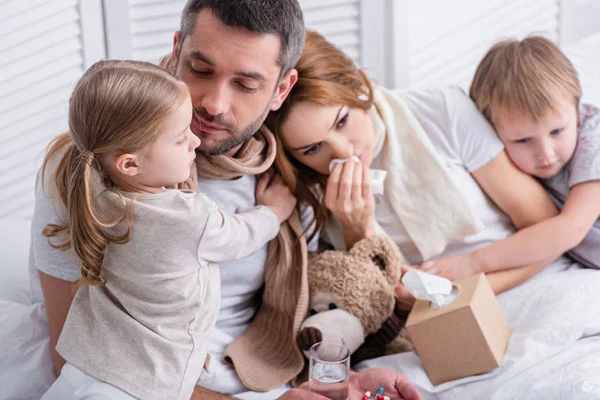 Adorable Sister Brother Hugging Sick Parents Bedroom — Stock Photo, Image