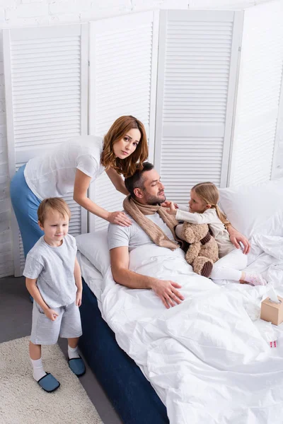 High Angle View Wife Children Taking Care Sick Father Bedroom — Stock Photo, Image