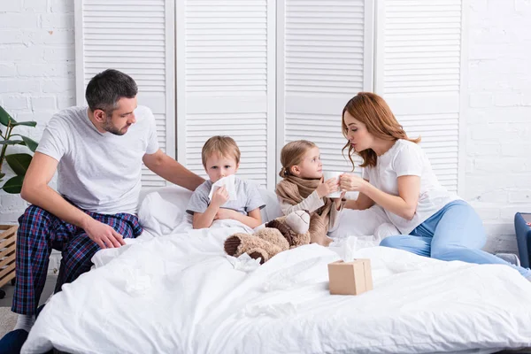 Parents Taking Care Sick Daughter Son Bedroom — Stock Photo, Image