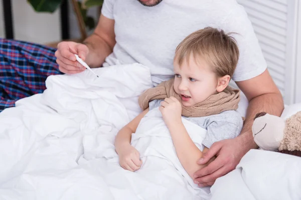 Cropped Image Dad Hugging Sick Son Bedroom Checking His Temperature — Stock Photo, Image