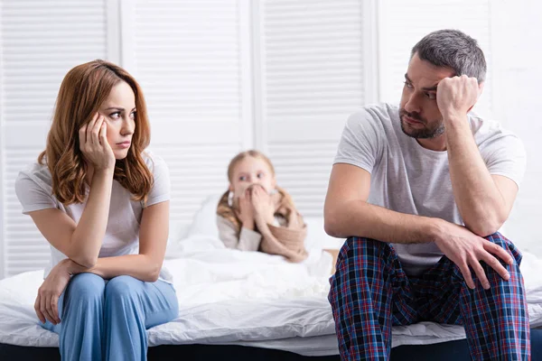 Worried Parents Sitting Sick Daughter Bedroom Looking Each Other — Stock Photo, Image