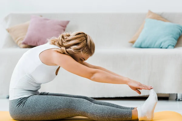 Woman Sportswear Exercising Yellow Fitness Mat Couch Living Room — Stock Photo, Image