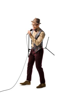stylish mixed race male musician holding microphone and singing isolated on white clipart