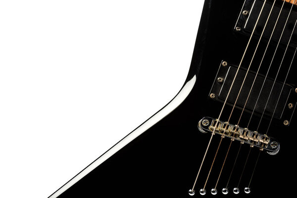 close up view of black electric guitar isolated on white