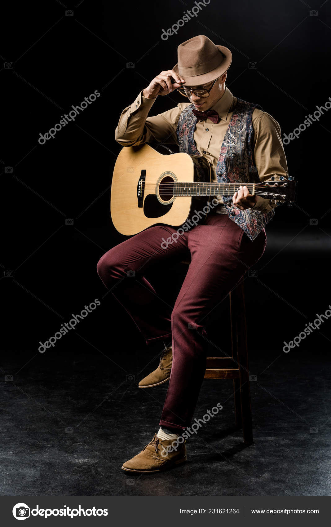 Guitarist Pose Seated Studio Playing Guitar Stock Photos - Free &  Royalty-Free Stock Photos from Dreamstime